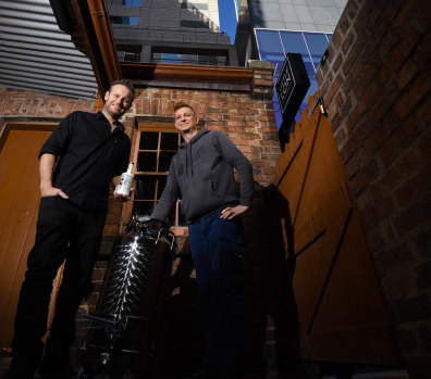 Spirited: Brothers Brad (left) and Jarrod Wilson run a new gin distillery and bar at 17 Casselden Place, an early Melbourne brothel and sly grog shop now ringed by skyscrapers. 