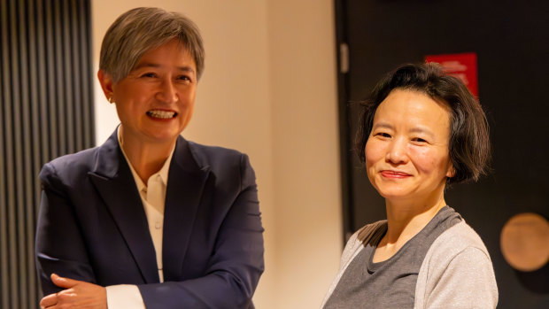 Australian journalist Cheng Lei with Foreign Minister Penny Wong at Melbourne Airport on Wednesday.