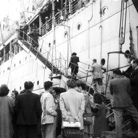 A large number of Indonesians on the wharf, with Australian supporters, cheered as seamen lining the decks shouted "Down with the Dutch." 