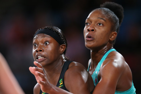 Shimona Nelson, left, and Kadie-Ann Dehaney compete for the ball. 