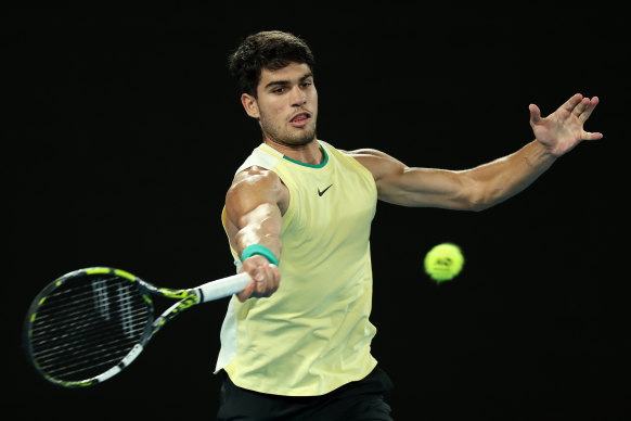 Carlos Alcaraz of Spain plays a forehand against Alexander Zverev.