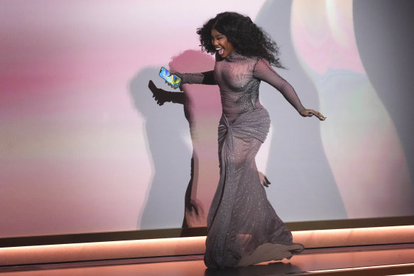 Sorry I’m late: SZA accepts the award for best R&B song for Snooze.