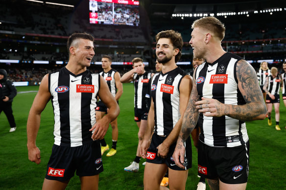 Nick Daicos with Josh Daicos and Jordan De Goey after the Magpies’ win over Sydney.