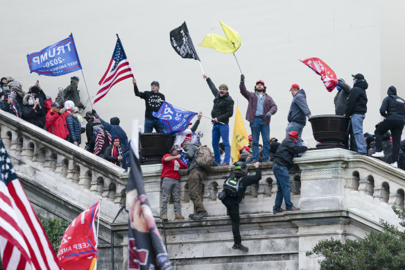 Rioters take over the US Capitol building in Washington, DC on January 6, 2021.