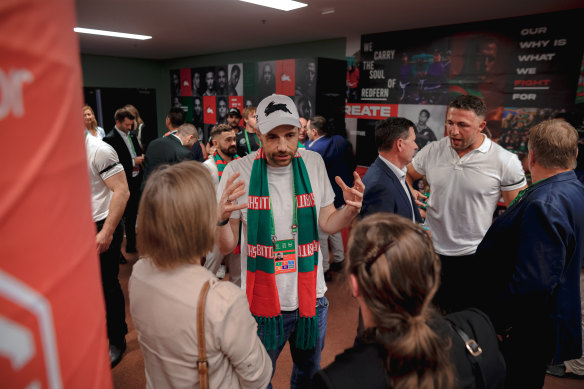 Billionaire Mike Cannon-Brookes soaks up the emotion in the South Sydney sheds on Saturday night.