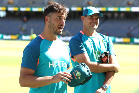 Marcus Stoinis with a cap and a few words for Xavier Bartlett.
