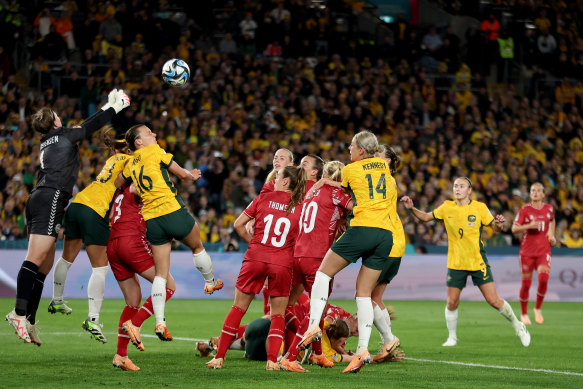 Lene Christensen punches the ball away after a Matildas corner.