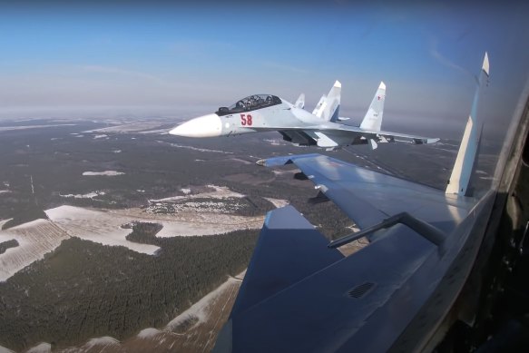 In this photo taken from video provided by the Russian Defense Ministry Press Service Su-30 fighters of the Russian and Belarusian air forces fly in a joint mission in 2022.