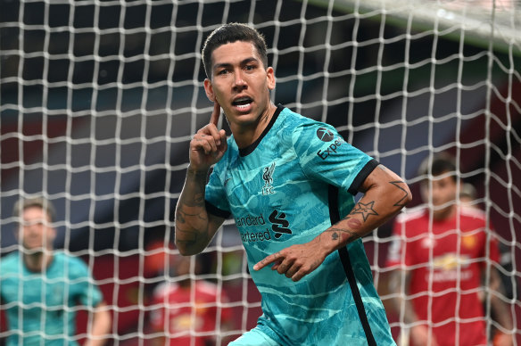 Roberto Firmino celebrates the first of his two goals in Liverpool’s 4-2 Premier League win over Manchester United.
