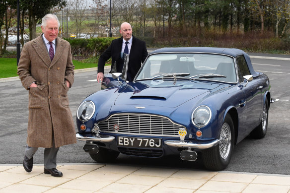 Charles, pictured in 2020 with his Aston Martin DB6, which runs on  biofuel.