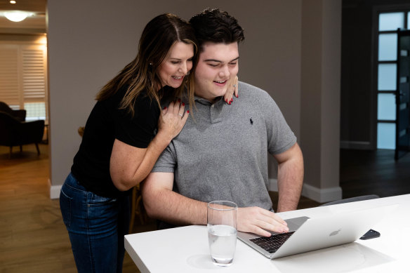 Flynn Broom with his mother, Katie Broom, gets his HSC results at 6am in Kellyville.