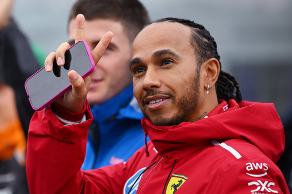 Lewis Hamilton greets the fans.