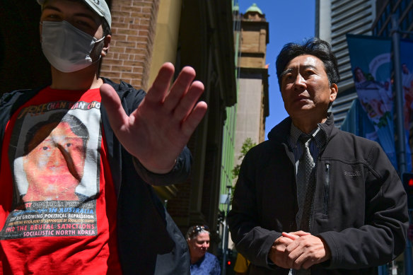 Chan Han Choi arrives with supporters to the King Street Supreme Court in Sydney on Wednesday. 