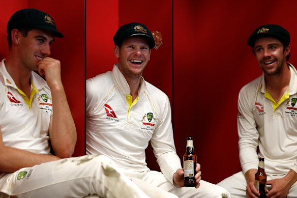 Steve Smith, centre, celebrated Australia's retention of the Ashes in September.