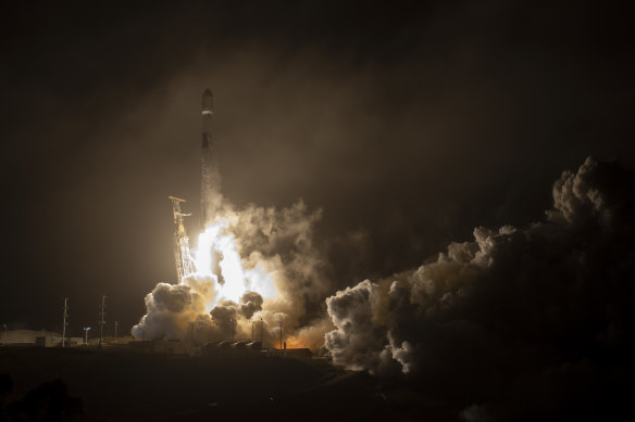 The SpaceX Falcon 9 rocket launches with DART onboard.