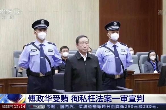 Former Chinese justice minister Fu Zhenghua appears at a court session for his verdict on Thursday, in an image taken from state TV footage. 