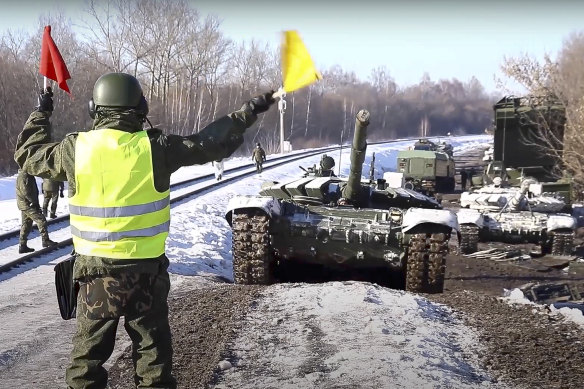 Truth or lies? The Russian Defence Ministry Press Service released images and a video showing what it said were army tanks being loaded up for transportation back to their base after drills. 