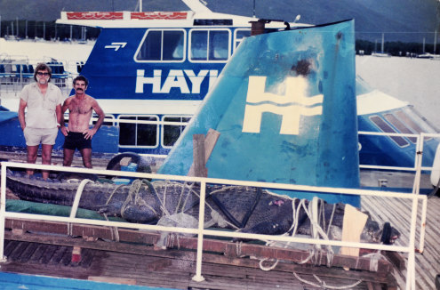 A copy photo taken in 1984 of Marineland Melanisia owner George Craig (left) with saltwater crocodile “Cassius” after he caught him near Darwin.