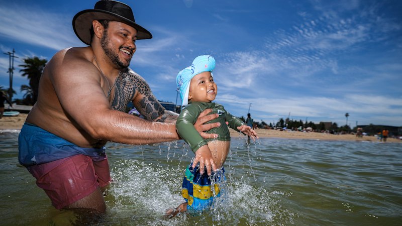 Melbourne’s see-saw summer sees bathers replaced by jumpers