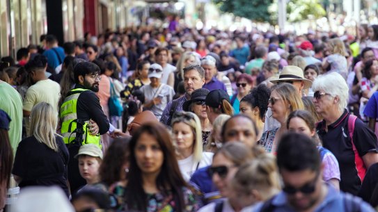 Shoppers out in force before Christmas. They may be buoyed by a return to real wages growth in 2024.