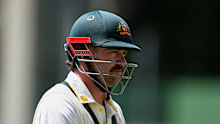 Australia’s Travis Head walks back to the pavilion after his dismissal on day five.