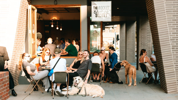 Bar hounds outside The Rocket Society.