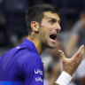 As it happened: Novak Djokovic wins bid to play in 2022 Australian Open; COVID-19 cases continue to surge across the nation