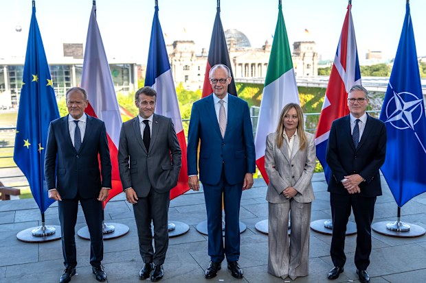 From right: British Prime Minister Keir Starmer, Italian Prime Minister Giorgia Meloni, German Chancellor Friedrich Merz, French President Emmanuel Macron and Polish Prime Minister Donald Tusk, pose for a group photo during the E5 summit of leading European nations ahead of the upcoming NATO summit, in Berlin, Wednesday June 24, 2026