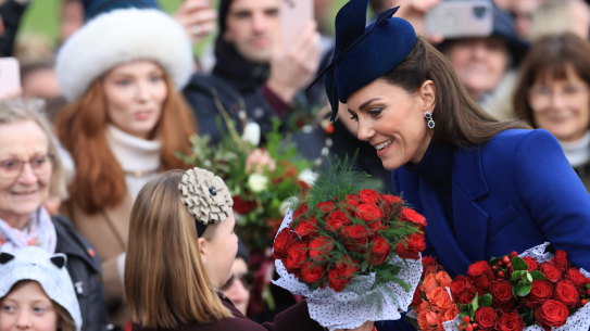 Catherine, Princess of Wales and Mia Tindall greet well-wishers after attending the Christmas Morning Service at Sandringham Church on December 25.