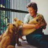 The author with African lion cub triplets Bruiser, Shinyanga and Njeri, in 2000. “Every day was different and exciting, even if the lunchroom was heavy with testosterone,” she says of her time at Taronga Zoo.