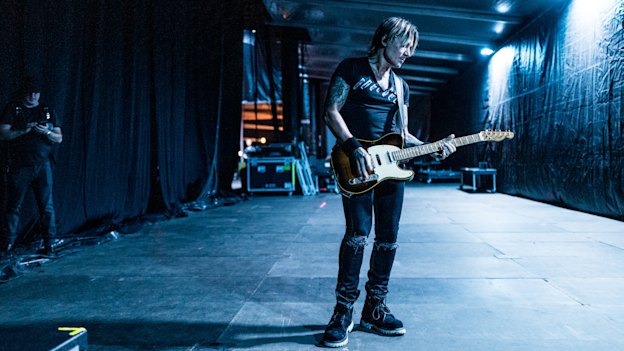 Keith Urban backstage during a festival in Nashville, Tennessee, last year. He says his songs always have their roots in real people: “I’m not creating something completely fictional.”