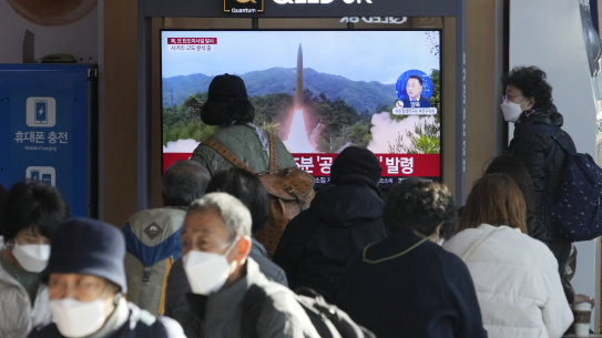 A TV screen shows a file image of North Korea’s missile launch during a news program at the Seoul Railway Station in Seoul, South Korea, Wednesday, Nov. 2, 2022. South Korea says it has issued an air raid alert for residents on an island off its eastern coast after North Korea fired a few missiles toward the sea.