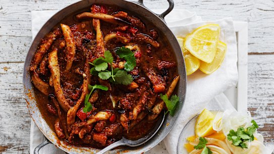 Tagine of squid, tomato and red capsicum.