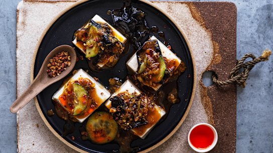 Steamed silken tofu with black vinegar and chilli oil.