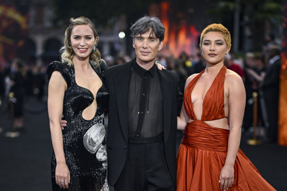 Emily Blunt (right), Cillian Murphy (centre) and Florence Pugh (left) at the “Oppenheimer” premiere in London on July 13, 2023. The actors left the event early, in support of the strike.