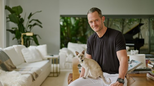 Tim Gurner, who only owns black or white clothes aside from holiday pastels, at his $17 million Toorak house.