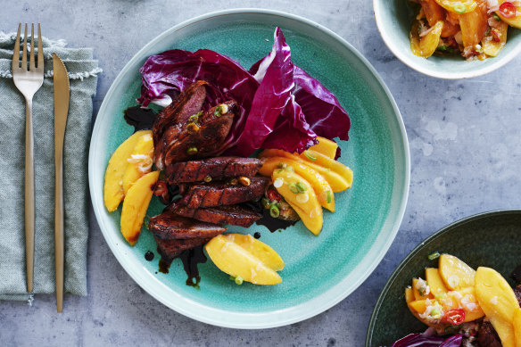 Sticky five-spice duck breast with persimmon.