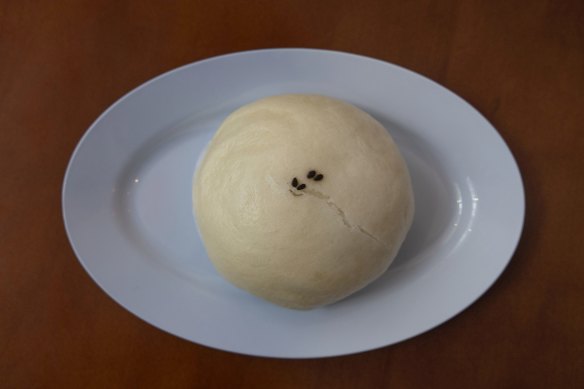 Pork and salted egg yolk bun (bao).