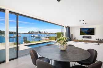 The Mayfield Avenue waterfront residence has views to Sydney Harbour Bridge.