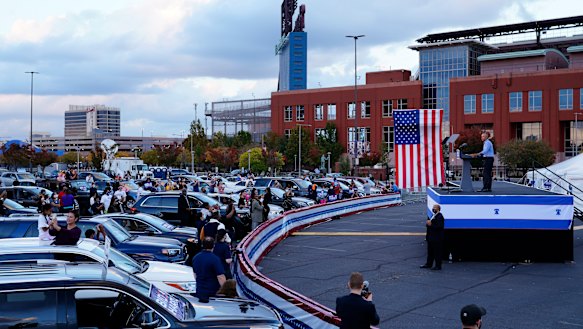 Former president Barack Obama campaigns for Joe Biden at a drive-in rally in Philadelphia.