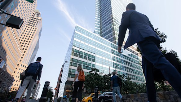 Office workers in New York: Wall Street banks have been at the forefront of the push to restock America’s skyscrapers with workers.