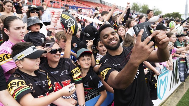 Sunia Turuva with Panthers fans during grand final week.