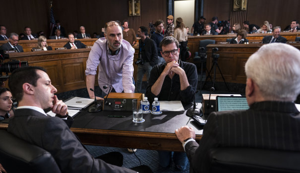 Succession creator Jesse Armstrong (blue shirt) with director Mark Mylod and cast on set. 