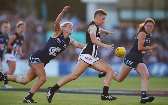 Emma Grant in action for Collingwood in the first AFLW game.