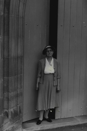 "Mrs. Elise Lund outside the Garrison Church ... she is its oldest attending parishioner. March 31, 1960."