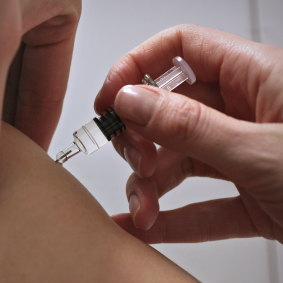 Parents are urged to vaccinate children against flu as cases spike.
