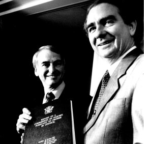 Royal Commissioner Tony Fitzgerald handing his report to then-Queensland premier Mike Ahern on July 2, 1989.