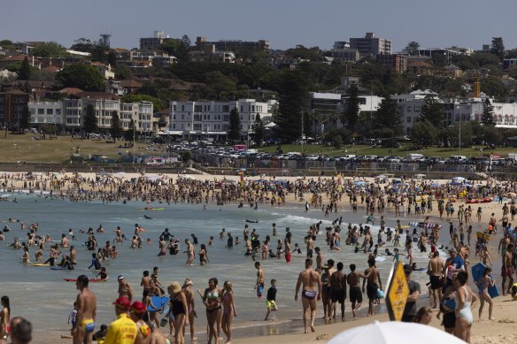 Beachgoers flocked to Bondi, where temperatures surpassed 35 degrees on Sunday.