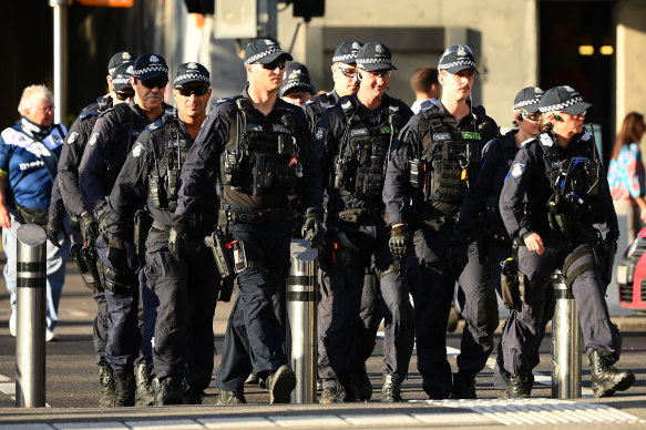 Police patrol outside AAMI Park during a match between Melbourne Victory and Melbourne City in February.