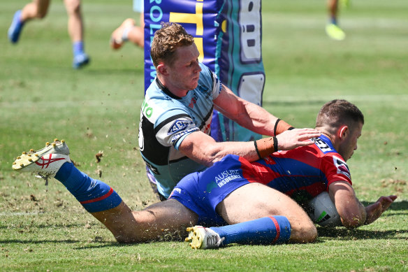 Jack Cogger scores for Newcastle.